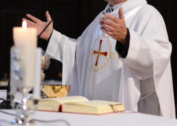 priest and worship at the altar