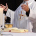 priest and worship at the altar