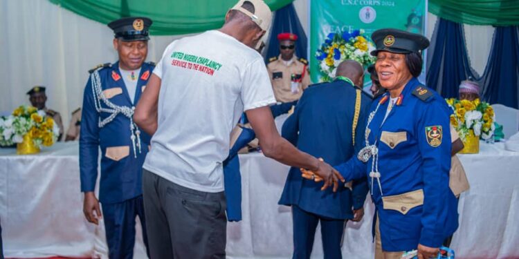 Congratulatory hand shake with Anambra State Commandant